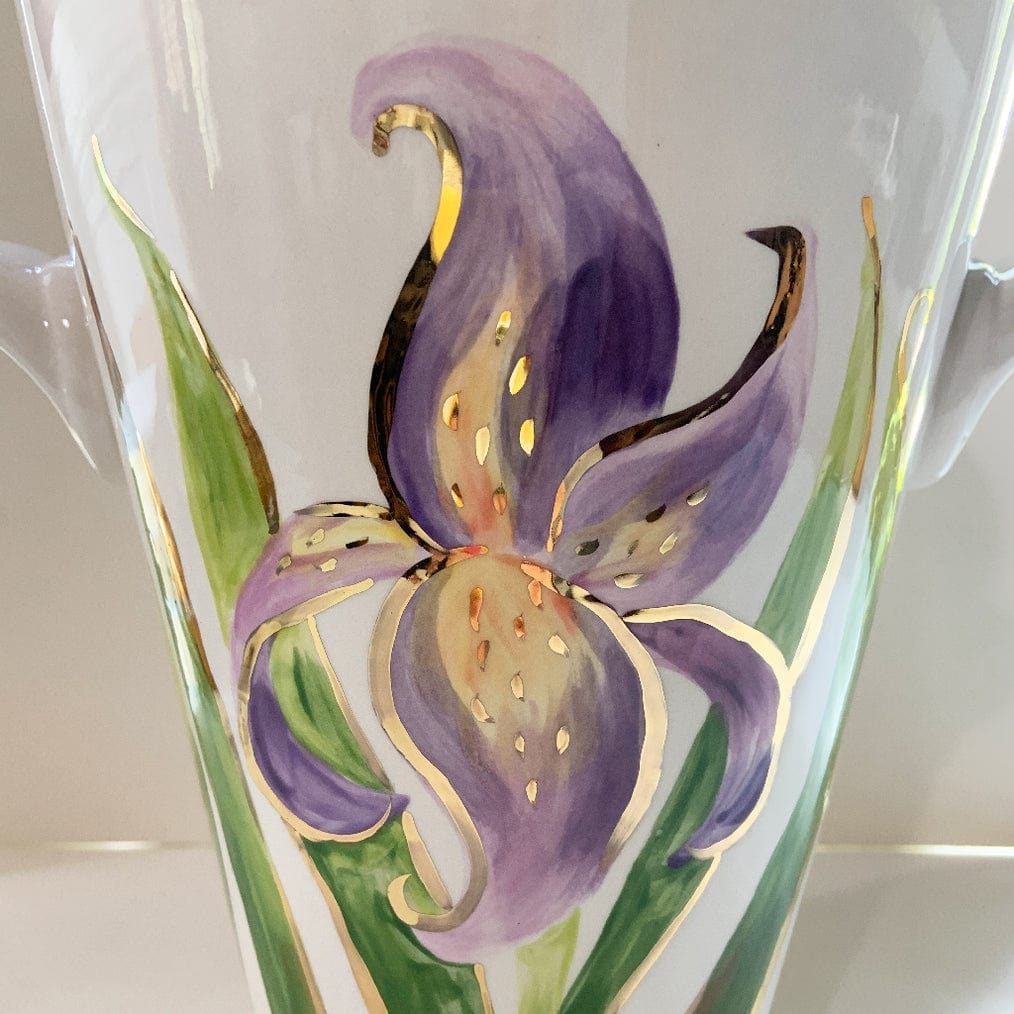Magnolia Creative Co Iris Champagne Chiller holding a bottle