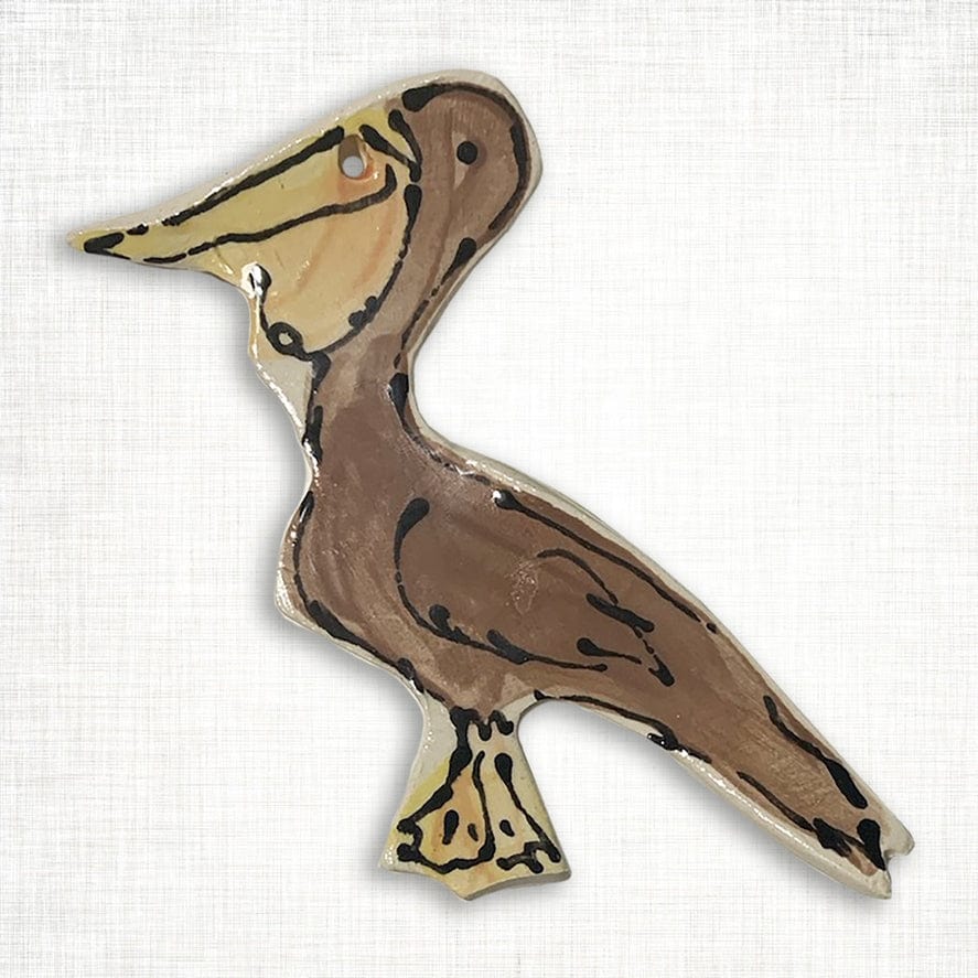 Magnolia Creative Co Brown Pelican ceramic Christmas ornament