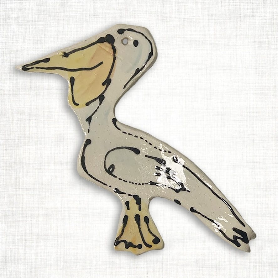 Magnolia Creative Co White Pelican ceramic Christmas ornament
