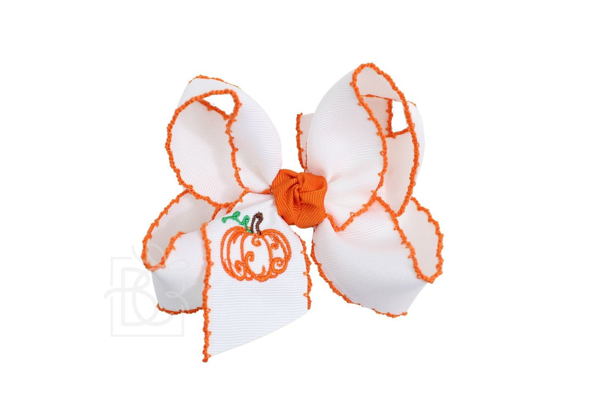 White and orange embroidered pumpkin crochet edge hair bow