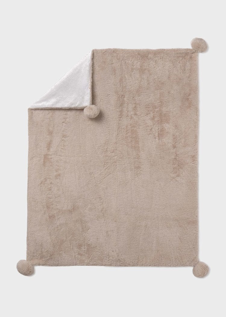 beige faux fur blanket