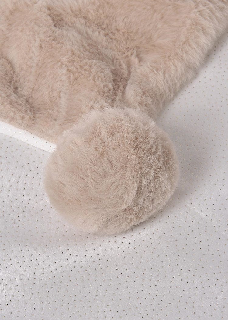 beige faux fur blanket