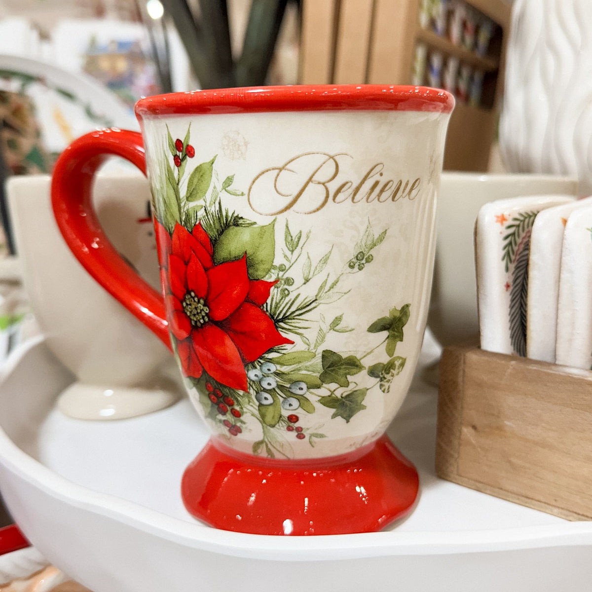 believe poinsettia mug