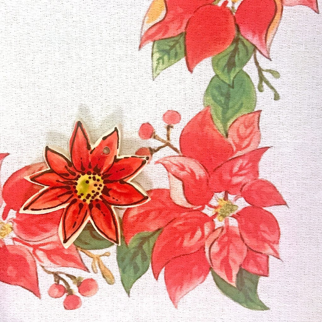 Magnolia Creative Co Poinsettia Wreath kitchen towel, detail view