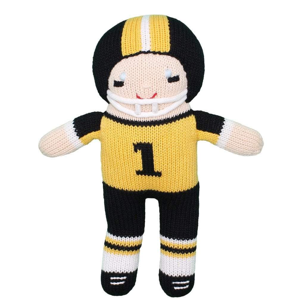 black and gold football player knit toy