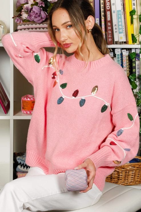 pink christmas light sweater