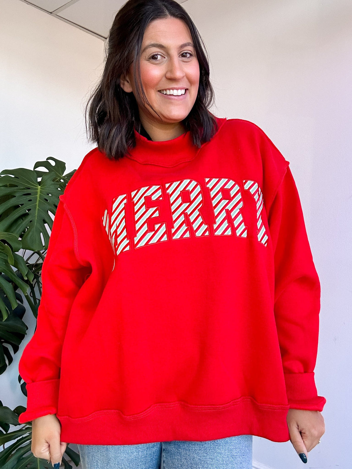 red oversized merry sweater