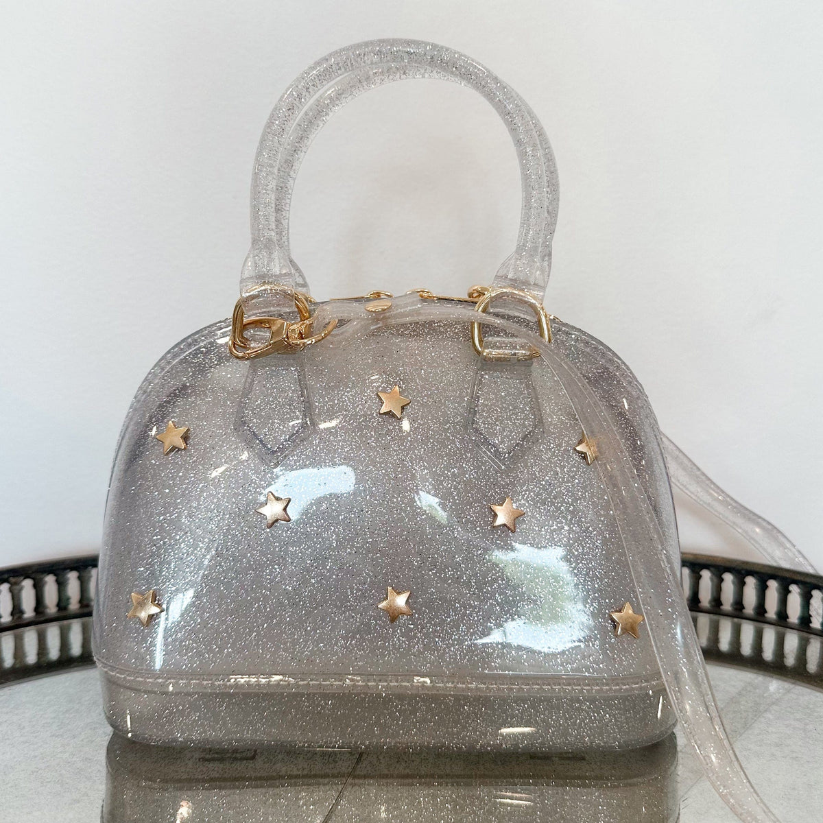 girls silver sparkle purse with gold stars