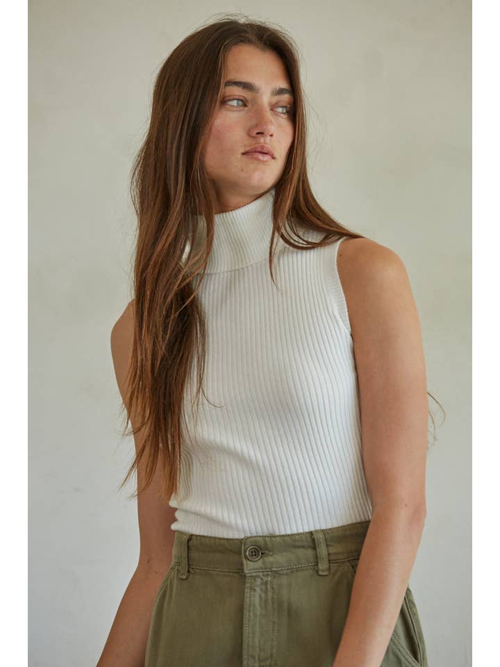 white sleeveless turtle neck