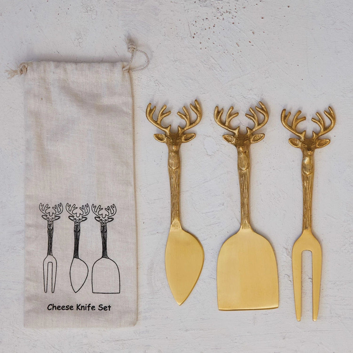 Creative Co-op Creative Co-op Brass Cheese Knives with Reindeer Handles, Set of 3 in Printed Drawstring Bag - Little Miss Muffin Children & Home