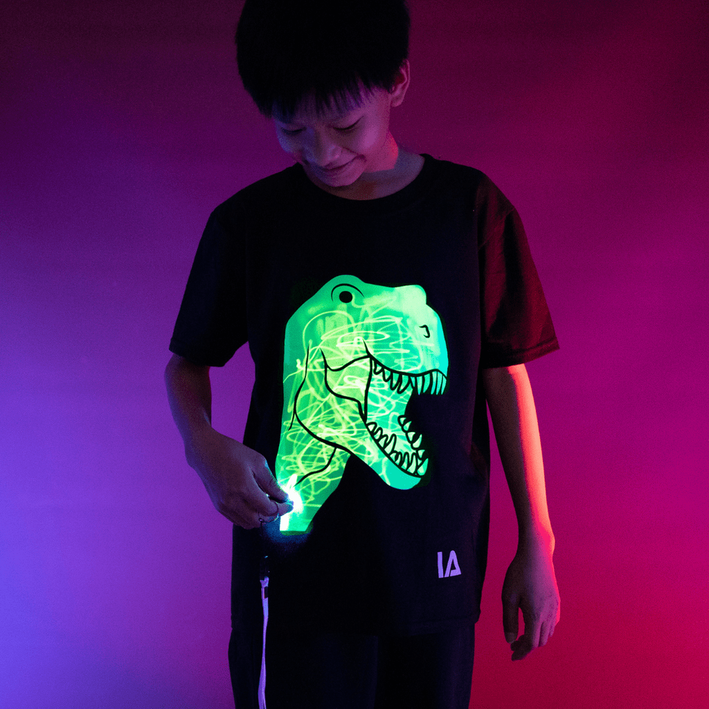 Illuminated Apparel Illuminated Apparel Kid's T-REX Dinosaur Interactive Glow In The Dark T-Shirt - Little Miss Muffin Children & Home