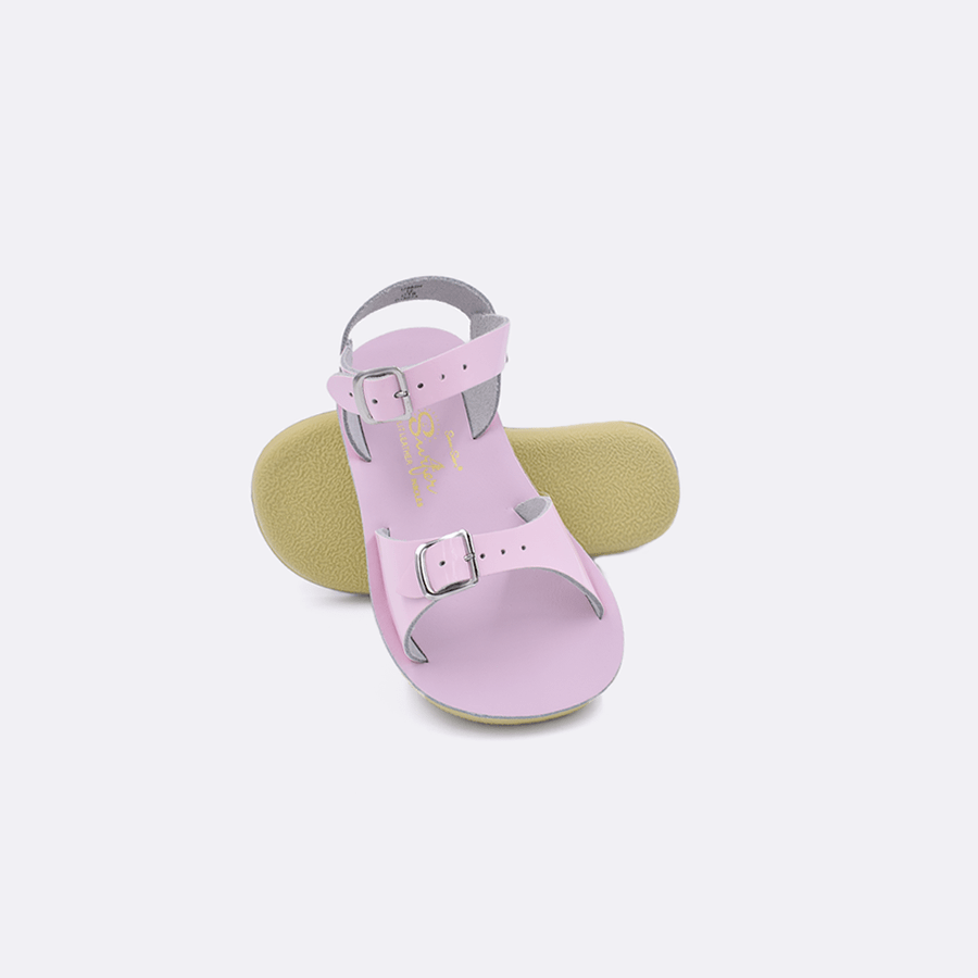 Double strap, rubber sole, leather surfer sandal by Saltwater Sandals in pink for children sizes five through twelve.