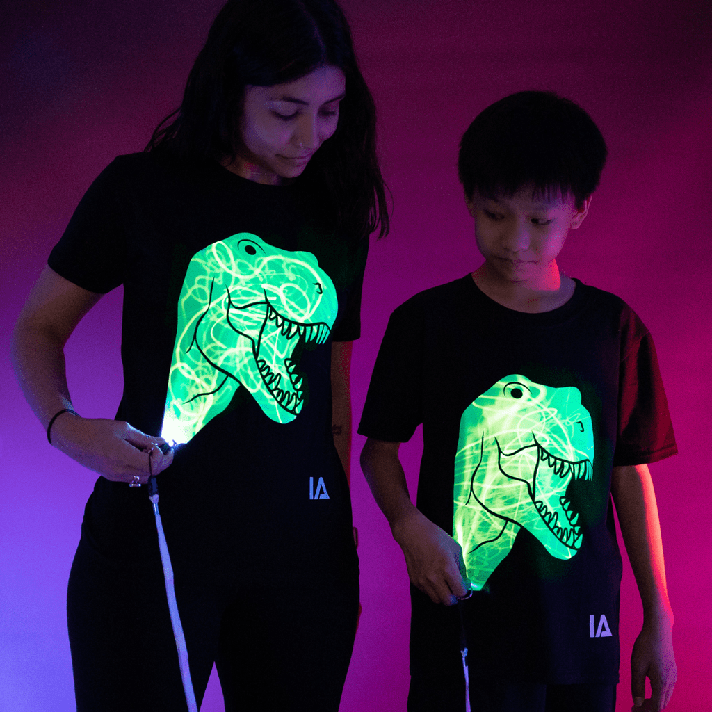 Illuminated Apparel Illuminated Apparel Kid's T-REX Dinosaur Interactive Glow In The Dark T-Shirt - Little Miss Muffin Children & Home