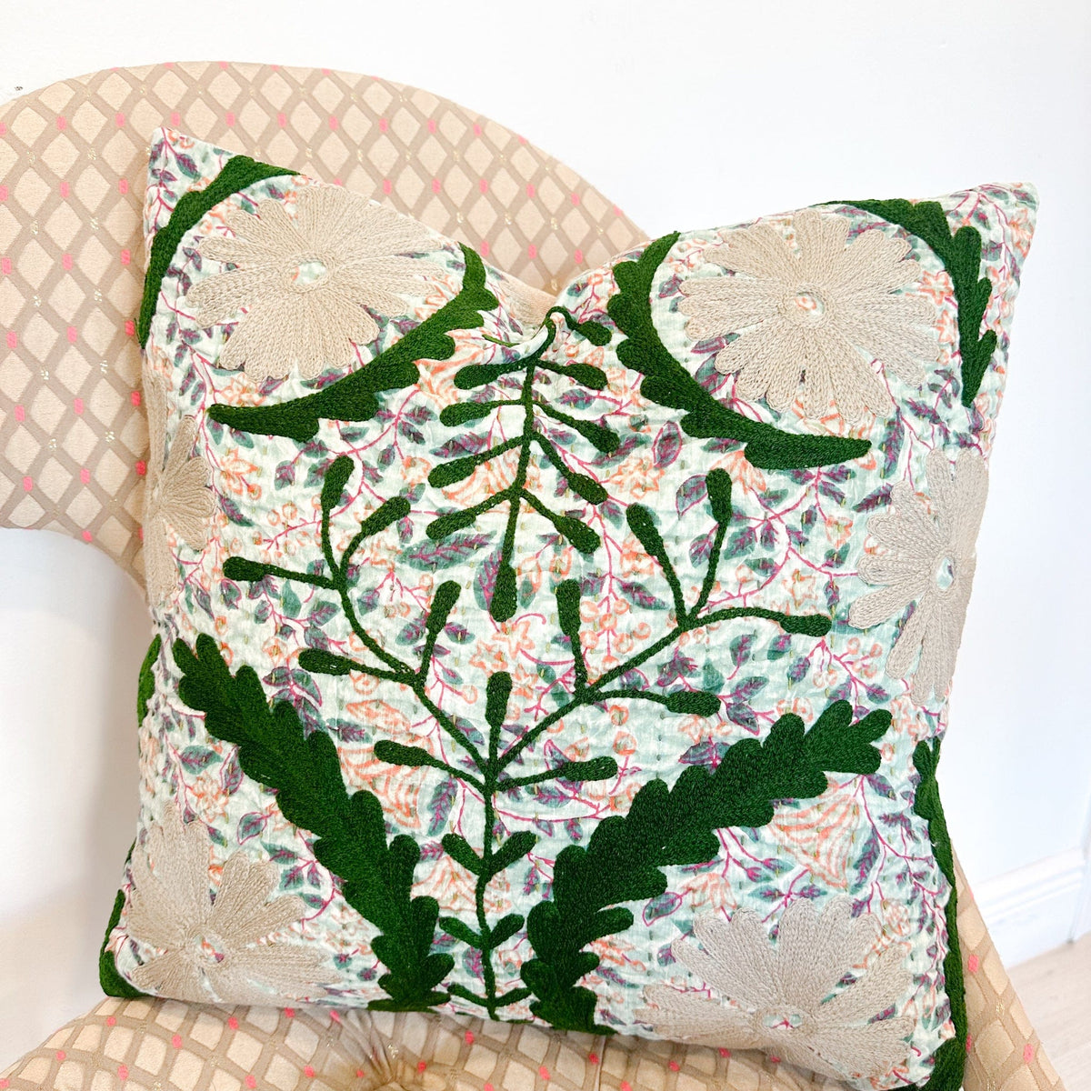 green embroidered pillow 